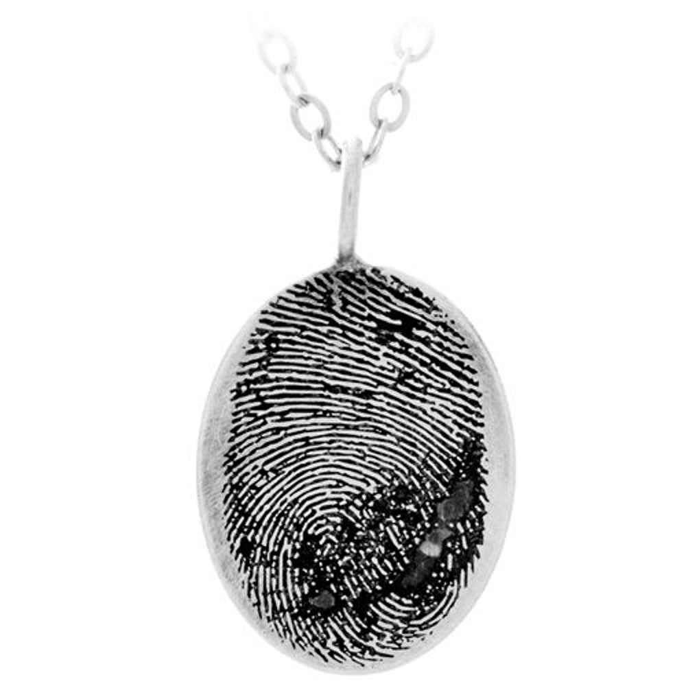 Memorial pendant engraved with a loved one's fingerprint