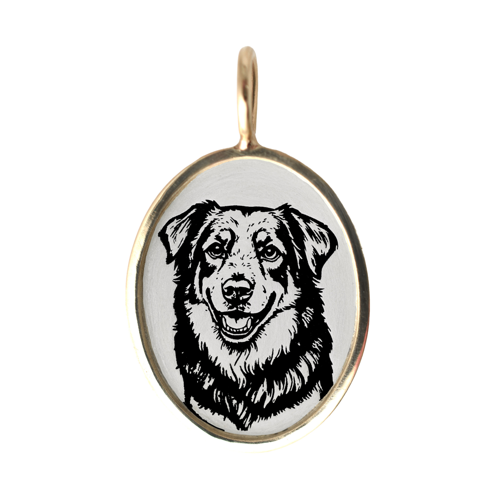 Personalized silver oval dog charm with 14K gold rim engraved with dog portrait